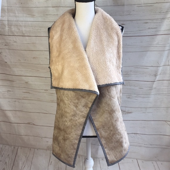 JODIFL Jackets & Blazers - Faux leather open front vest with faux fur lining